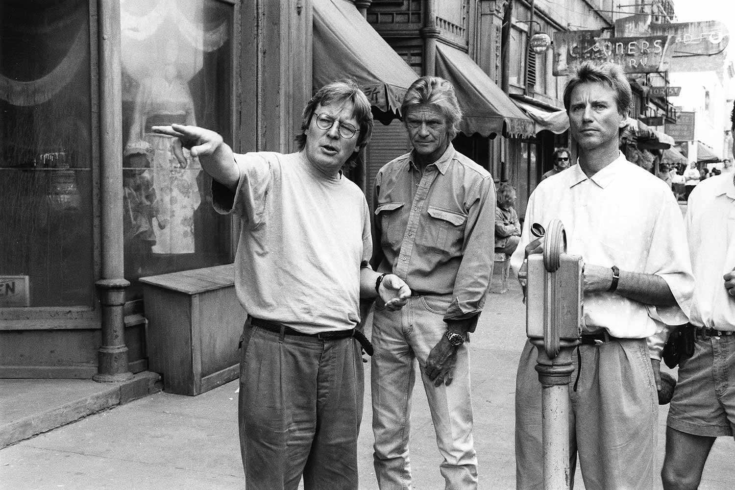 Alan Parker, Mike Roberts and Michael Seresin on set of Come Seethe Paradise