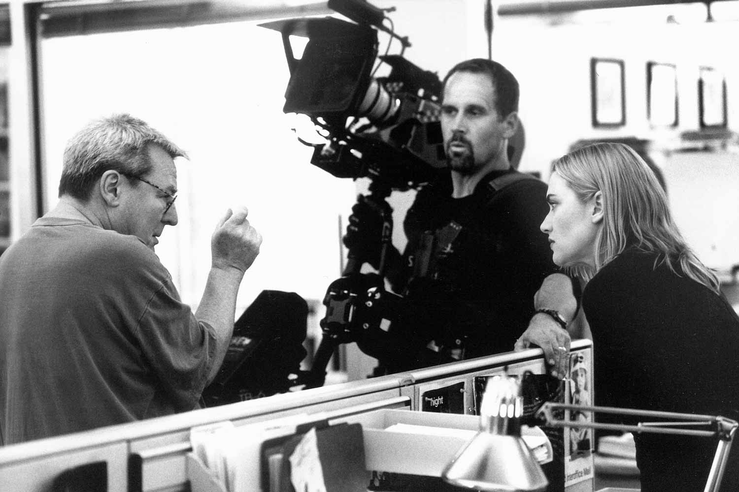 Alan Parker, Kate Winslet on the set of The Life of David Gale